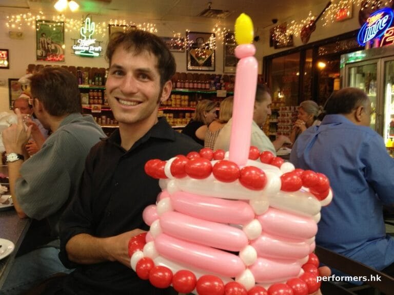 A Hong Kong event entertainer and also a professional balloon artist has finished a birthday cake balloons for the client.