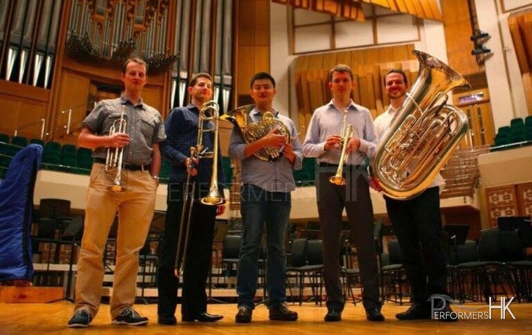 Hong Kong five Brass Band musician taking photo at a corporate event
