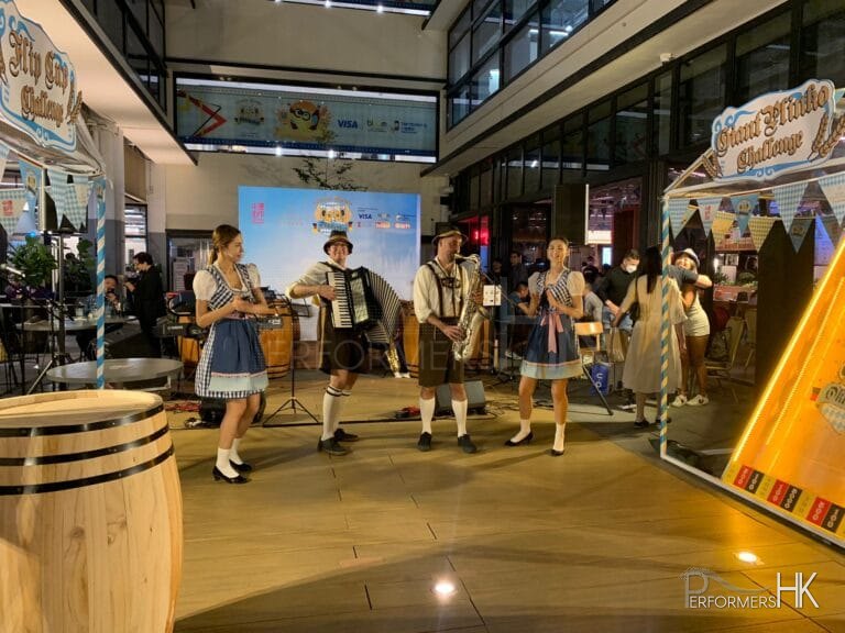 Full costume Oompah band, Hong Kong, with beer girls, Central market Hong Kong, 2023