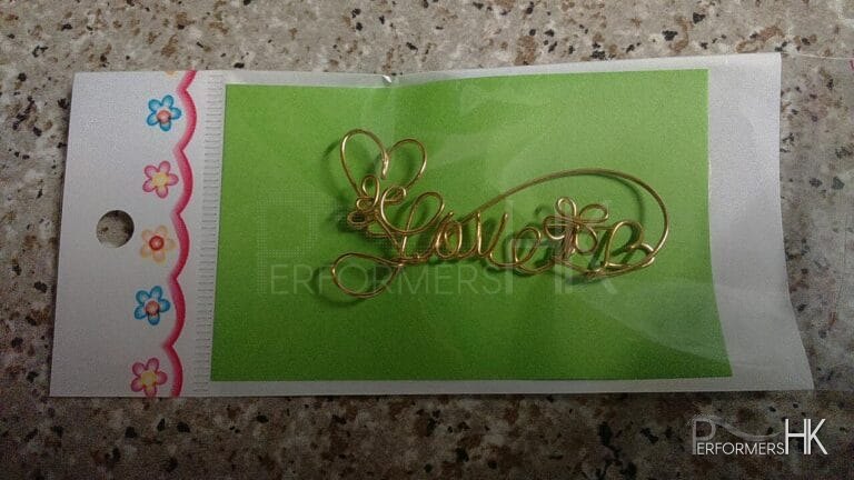 gold color wire names in plastic sleeve for clients