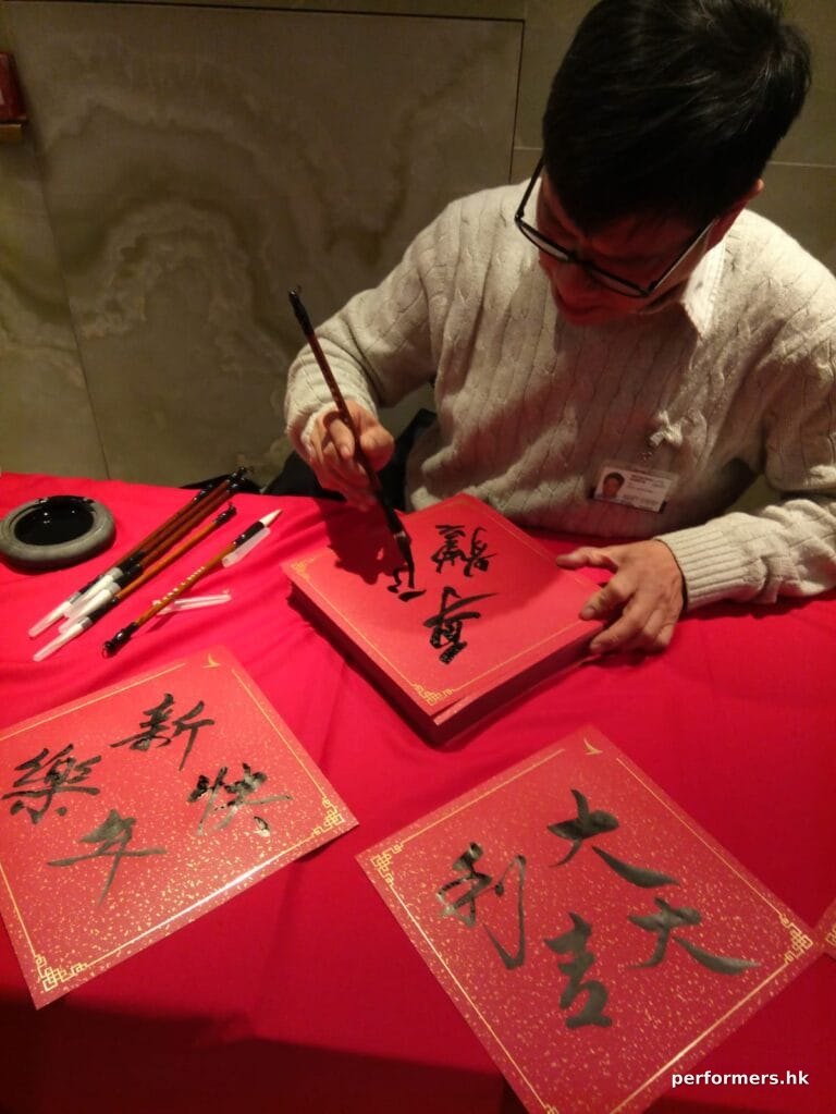 hong kong airport, cathay pacific artist working on fai chun