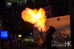 bartender blowing fire at a corporate event mixing cocktails