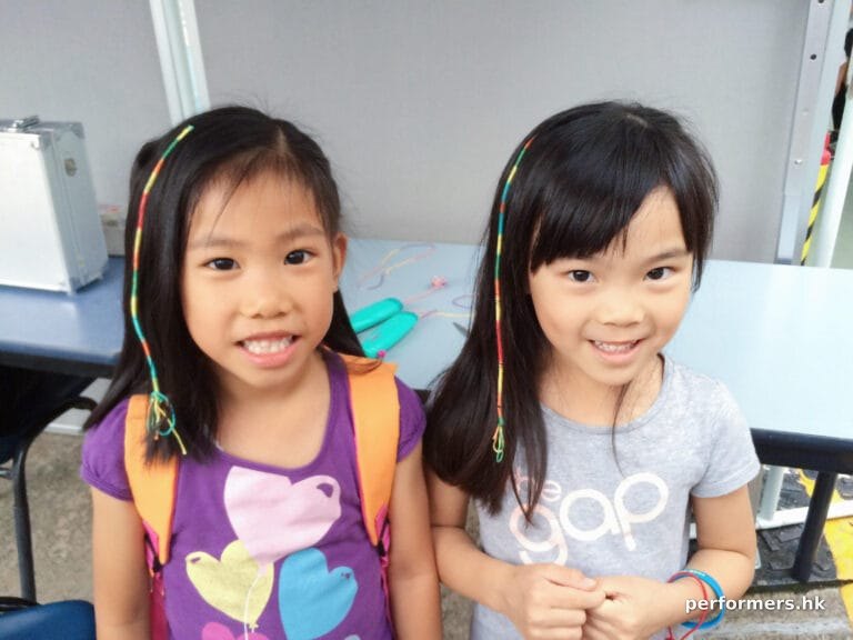 2 little girls with hair wraps