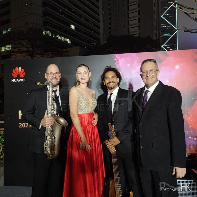 band with singer in central hong kong, sax, bass keyboard and vocals combo