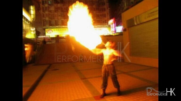 Juggler in HK performing breathing fire act a corporate function.