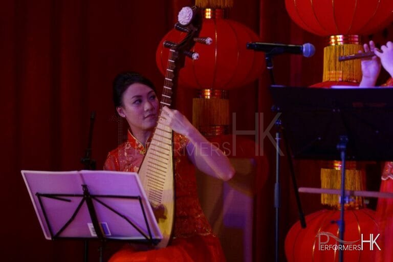 A Musician playing Chinese tradition instrument, Pipa , at a Hong Kong Bank Annual dinner event
