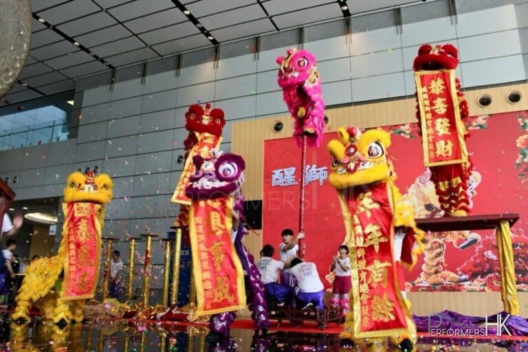 Six team Lion Dance Dancers in Hong Kong performing at a Corporate Chinese New Year function