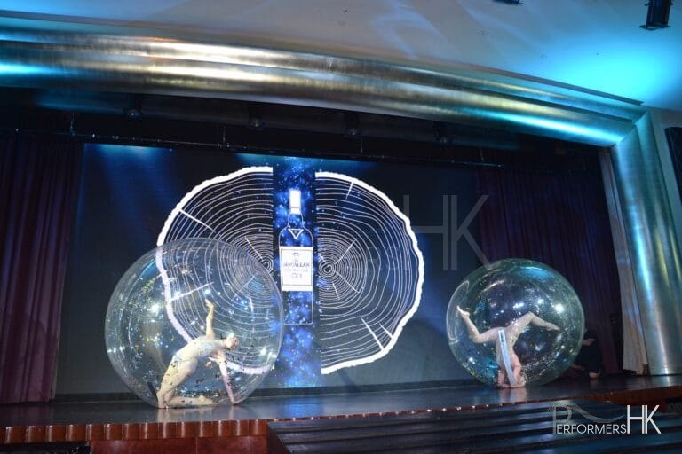 2 girls performing acrobatic movements