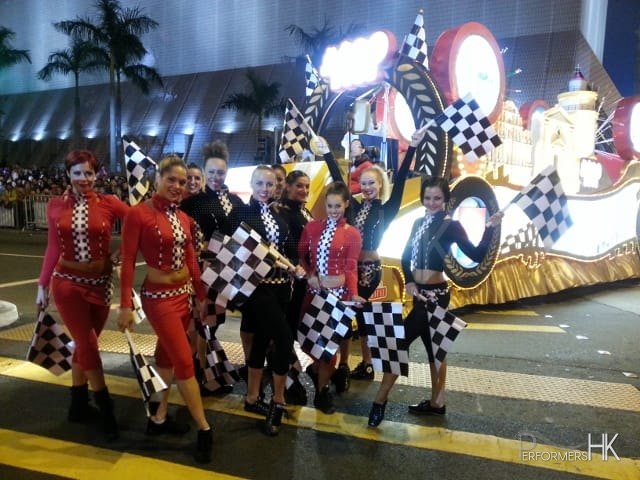 Models dressed as cheerleaders for the Hong Kong Chinese new year Parade