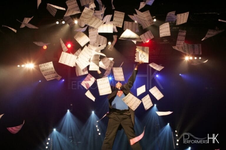 Magician during his performance of a music comedy