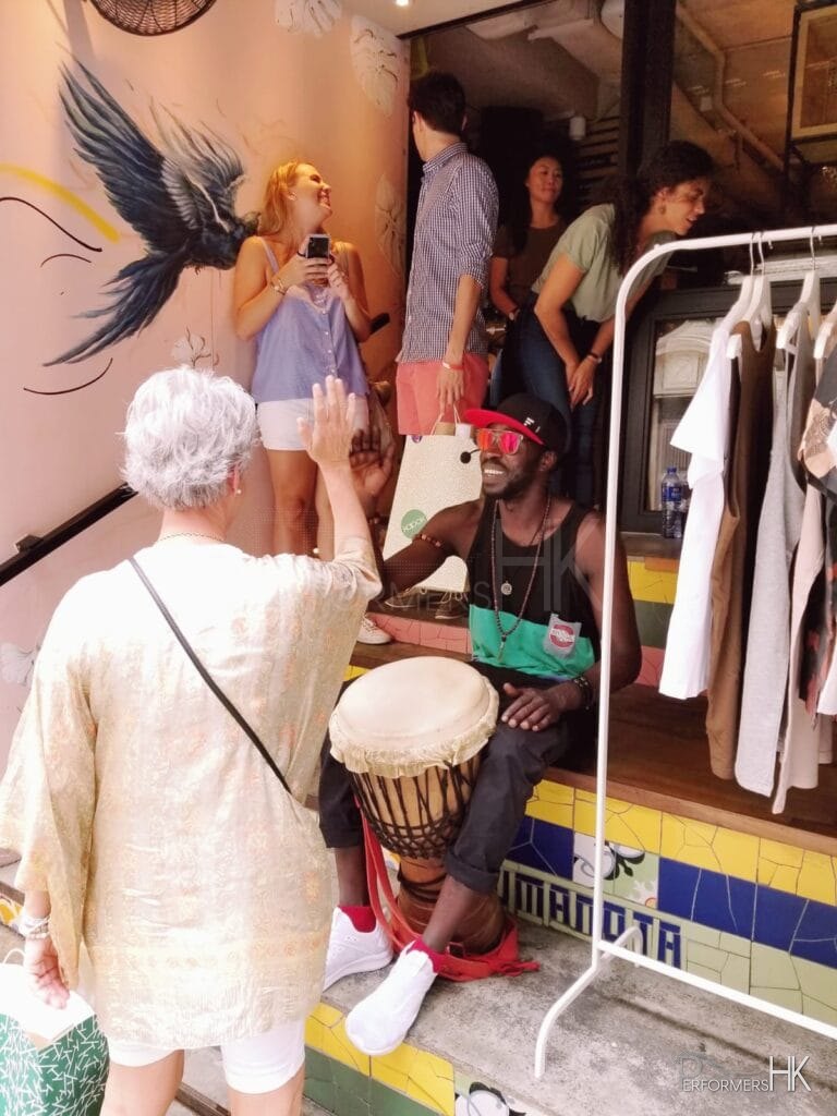 Drummer with older western lady