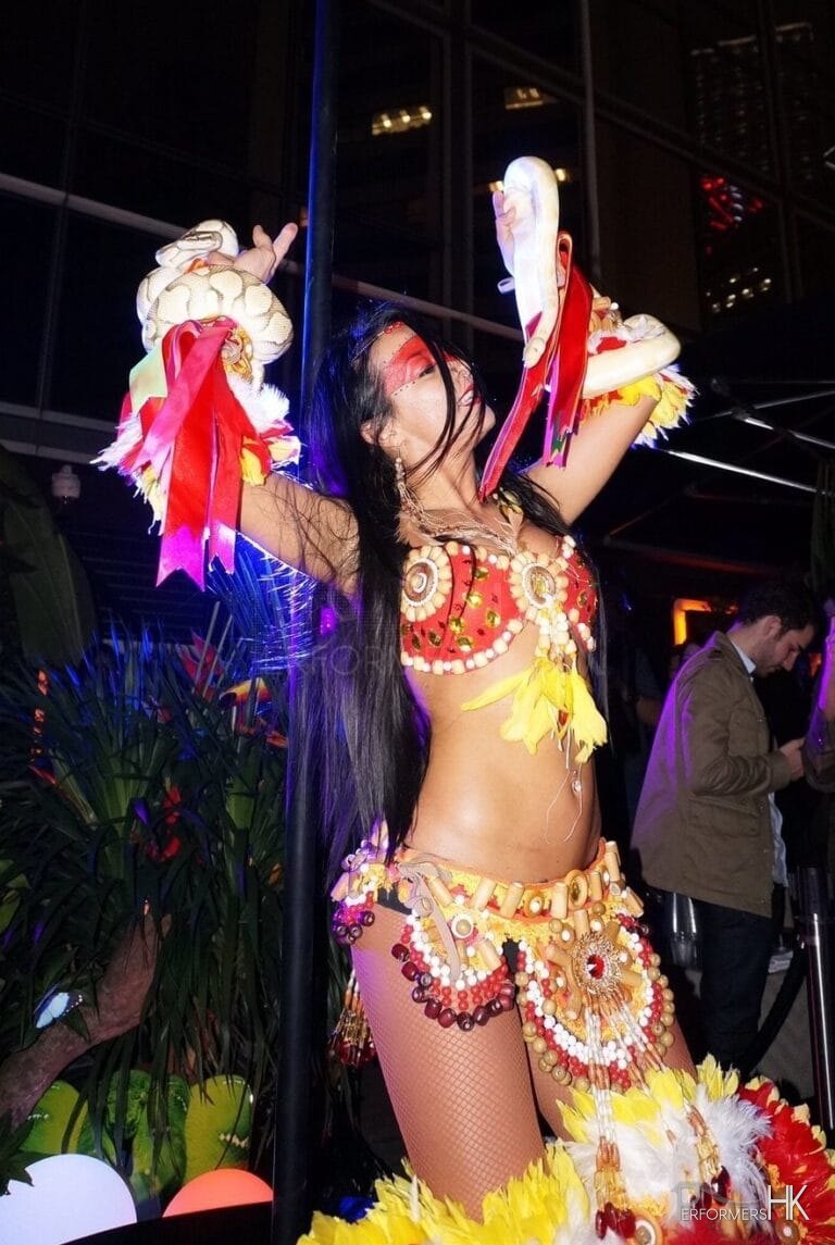 Female dancer performs with snakes