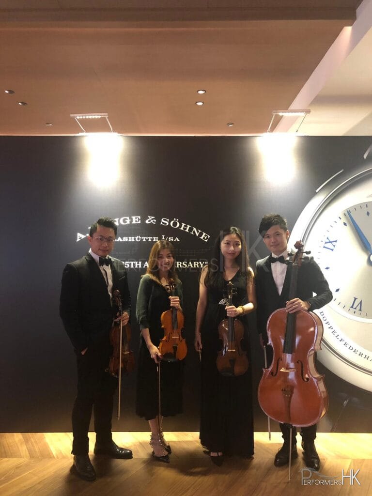 String players at watch maker event