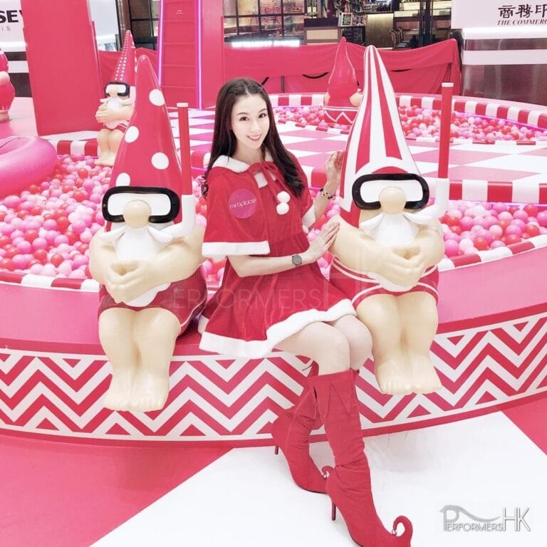 Suki sitting in front of Santa