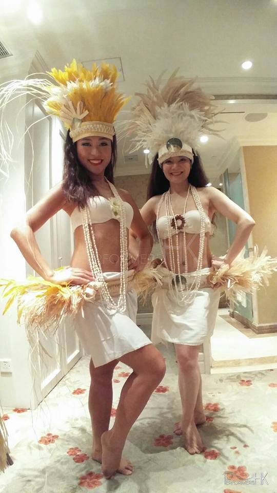 Two Hula and Tahiti Dancers in Hong Kong wearing white costume for a corporate annual dinner