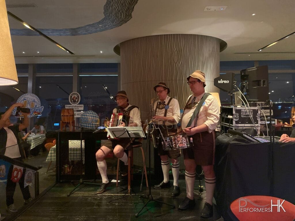 3 peice Oktoberfest band playing at event in W hotel hk
