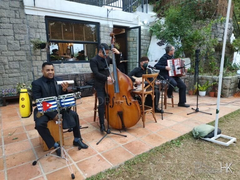 4 musicians in repluse bay Hong Kong, double bass, percussion, accordion, guitar combo