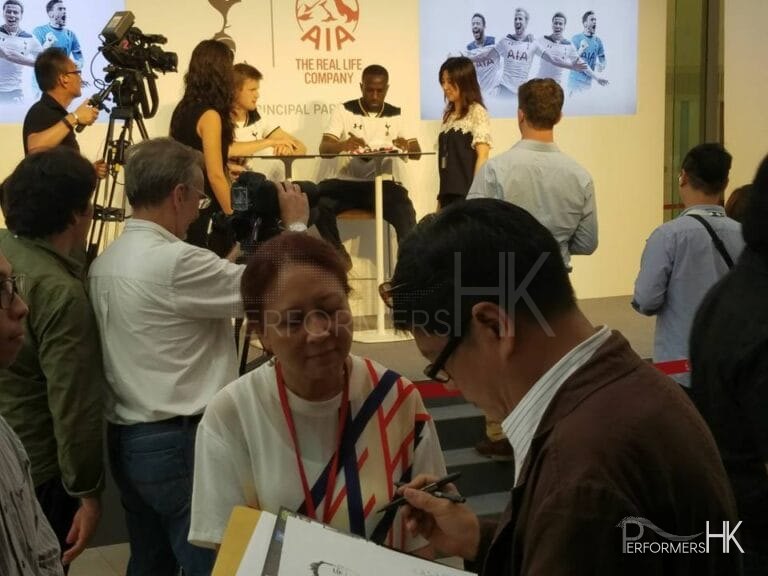 Artist drawing images for guests at event