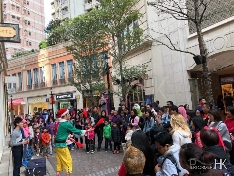 juggler in Hong Kong Lee tung avenue doing a street show
