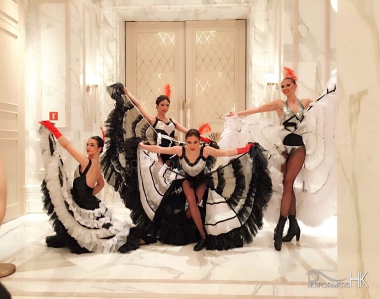 Four Can Can dancer in HK posing at a corporate function back stage