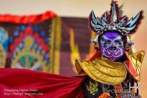 Hong Hong Traditional face changing performer performing at a Corporate event