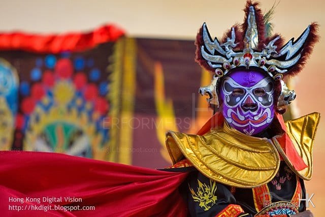 Hong Hong Traditional face changing performer performing at a Corporate event