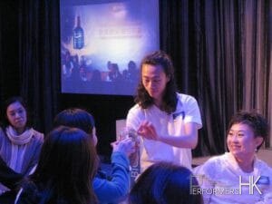 Hong Kong contact juggler performing to a client at a Biotherm product launch event