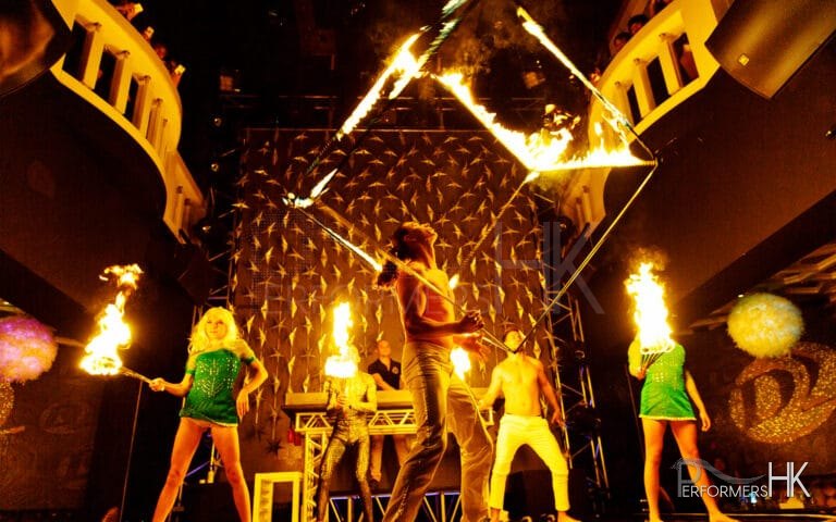 Hong Kong Five talented fire performer  performing with fire staff and fire cube at a corporate event