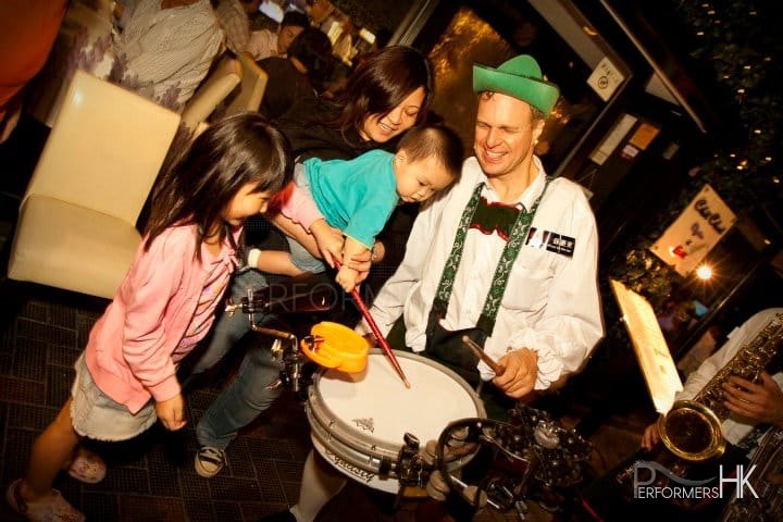 drummer teaches children how to play music