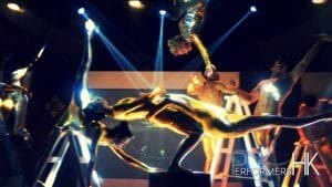 Eight Acrobat performers performing at a corporate event
