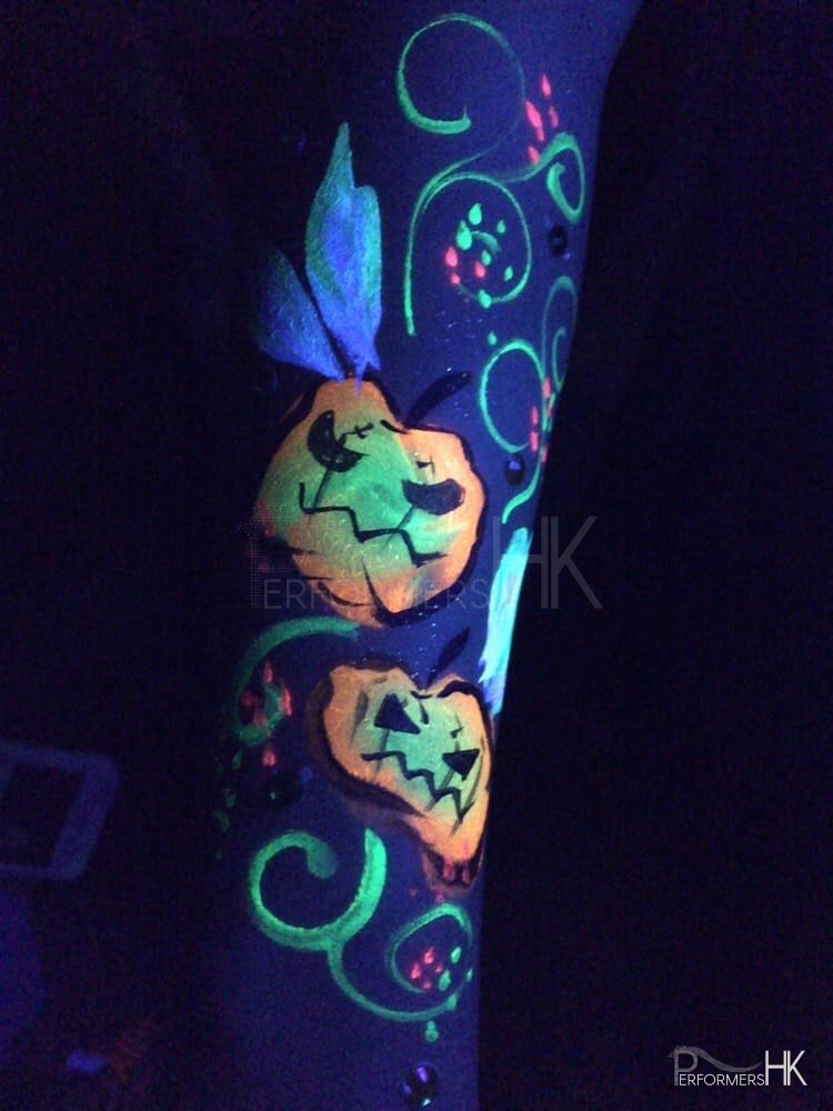 glowing the the dark body painted Halloween arm.