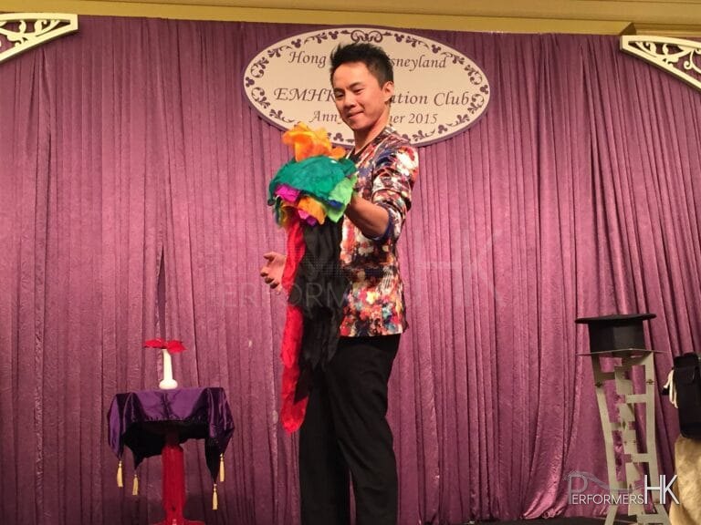 A Professional magician in HK is hired to perform a stage magic show with silks for a corporate annual dinner