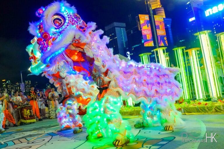 Beautiful duo led lion dancers ready to jump stilts