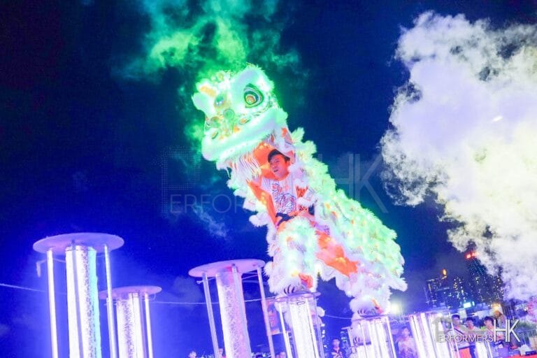 Our LED lion dancers bravely jumping on stilts at an event in Wan Chai harbour chill with the hong kong tourism board 2023