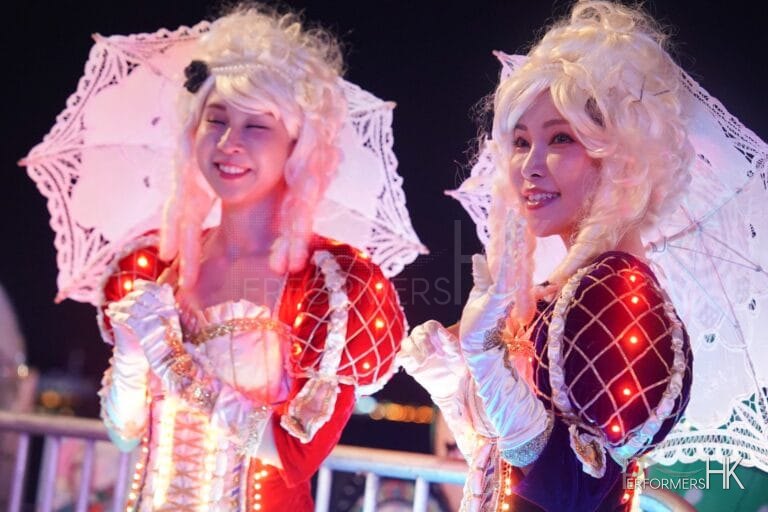 2 led custom made costume at a festival for hong kong tourism board one is red and the other is purple