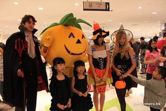 Hong Kong Models wear Halloween costume roving and taking picture with the guest at a shopping mall event