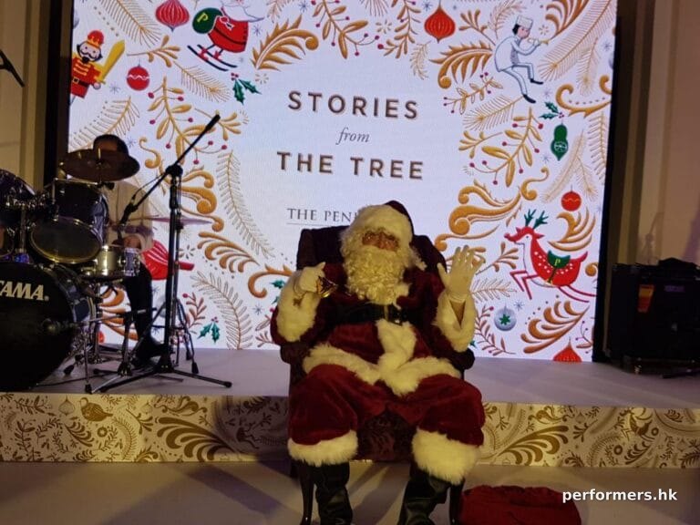 santa sitting at hotel ball room in hong kong tst area, peninsula hotel chritsmas event