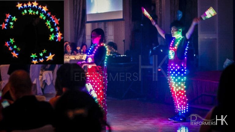 Two poi performer performing LED poi in a overall LED costume at Hong Kong Aberdeen Marina Club