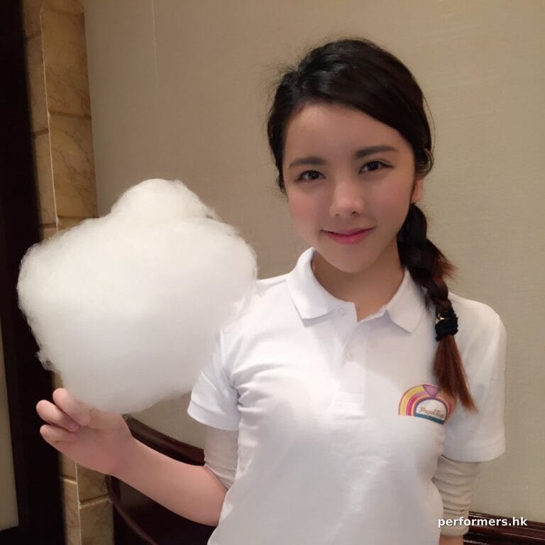 Model holding candy floss with clean white top