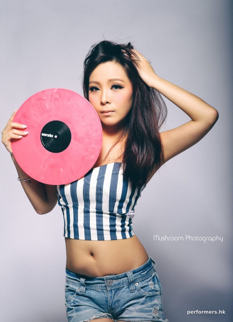 Female Dj Z wing promo shot holding pink vinyl