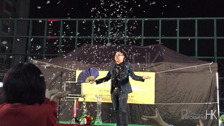 Magician in HK performing a snow storm magic at corporate annual event
